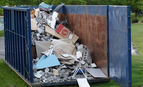 Front view of commercial waste containers at a Willesden site